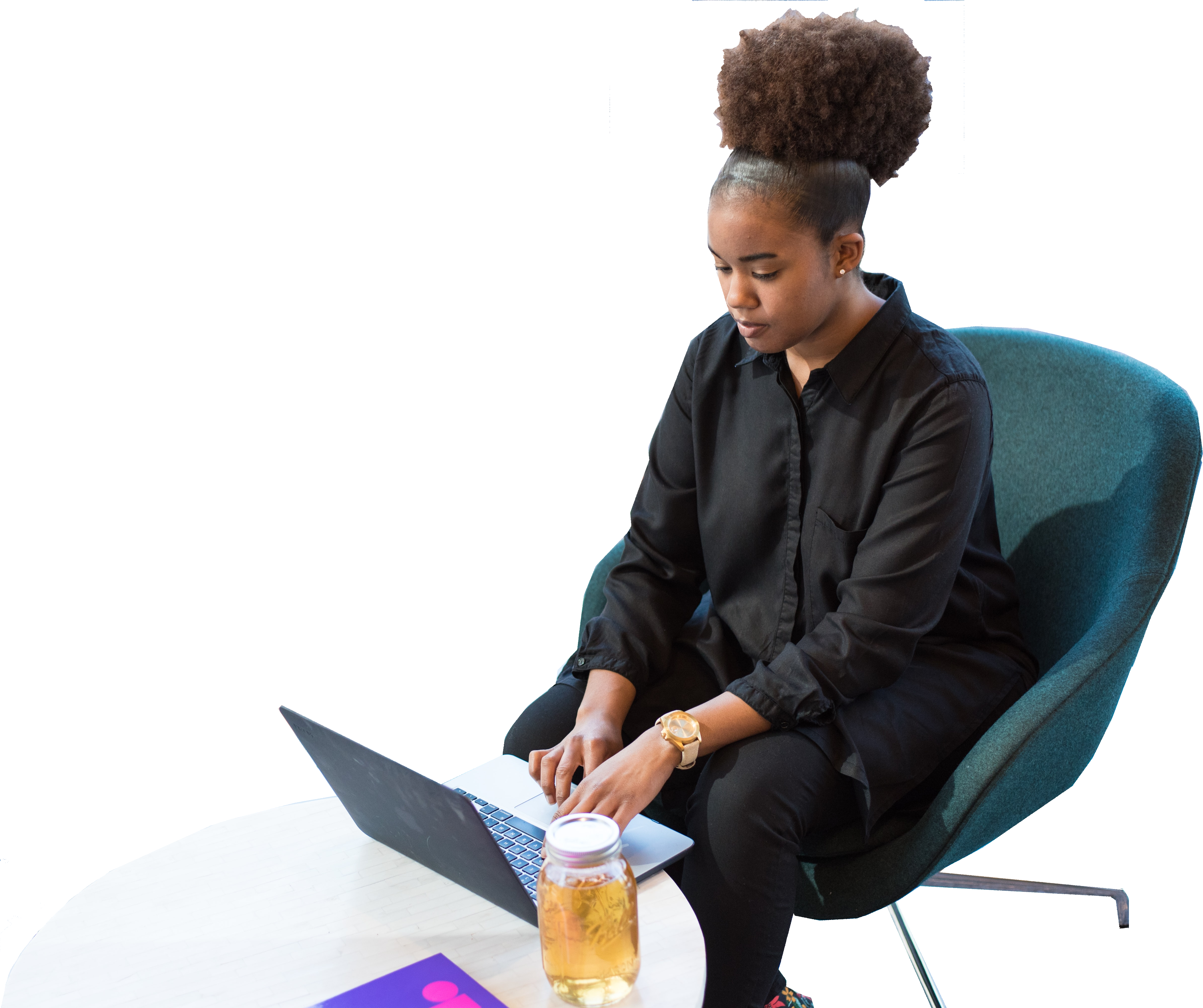 Woman sitting on computer in front of window